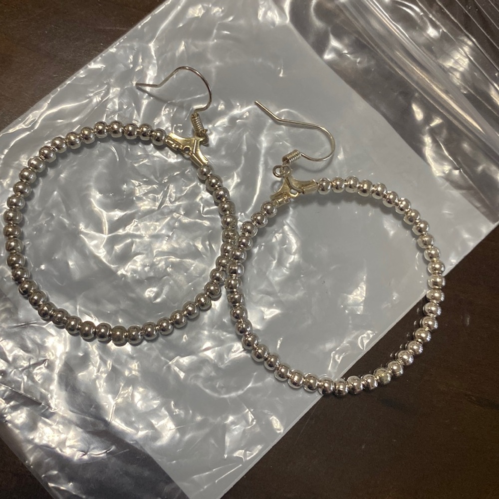 NWOT. Silver beaded Hoops